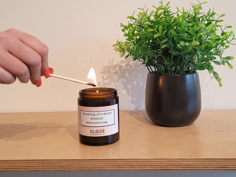 Dreaming of a World Without Mansplaining Candle